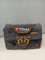mini love broches quilted bag in canvas