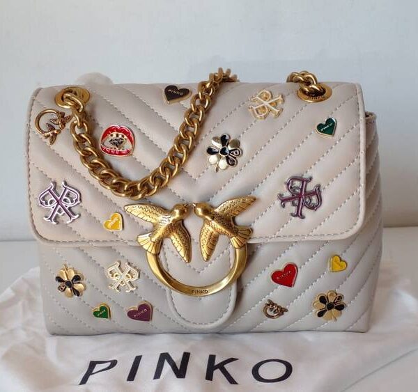 mini love broches quilted bag in leather