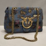 mini love broches quilted bag in canvas