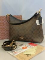 laurel shoulder bag in signatre canvas