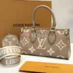 on the go east west bicolor monogram