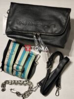 TEXTURED SLING BAG