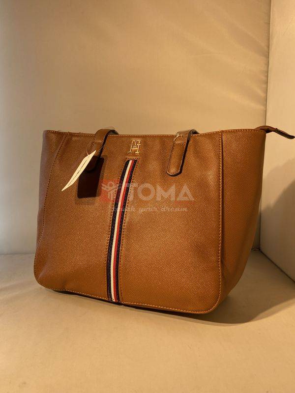 5500 tommy copy l 5500 - Image 1