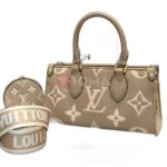 on the go east west bicolor monogram