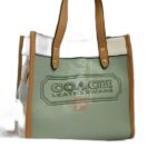 FIELD TOTE 22 IN COLOR BLOCK WITH COACH BADGE