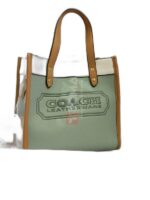 FIELD TOTE 22 IN COLOR BLOCK WITH COACH BADGE